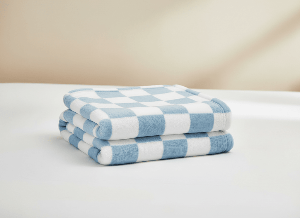 Soft checkered blue and white baby blanket