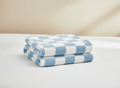 Soft checkered blue and white baby blanket