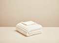 Soft striped cream baby blanket