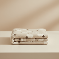Soft sheep-themed beige baby blanket
