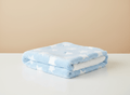 Soft star-themed light blue baby blanket