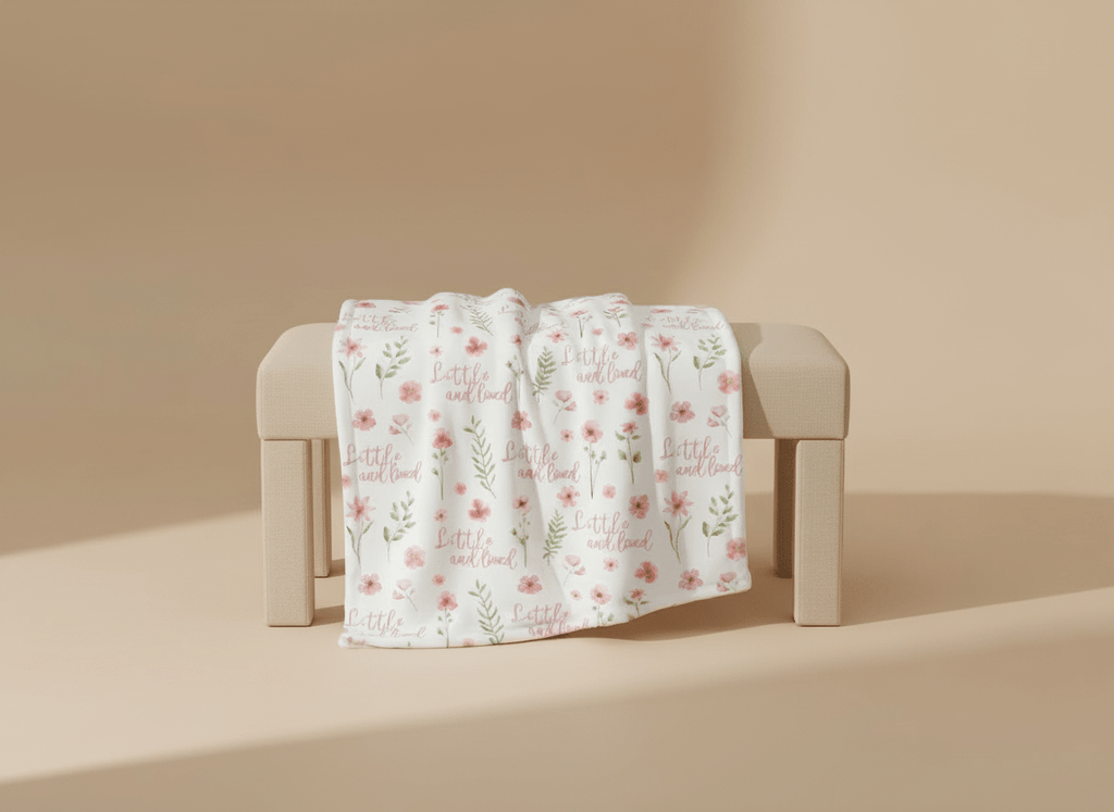 Soft floral pink baby blanket with dotted backing